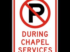 No Parking During Chapel Services Sign